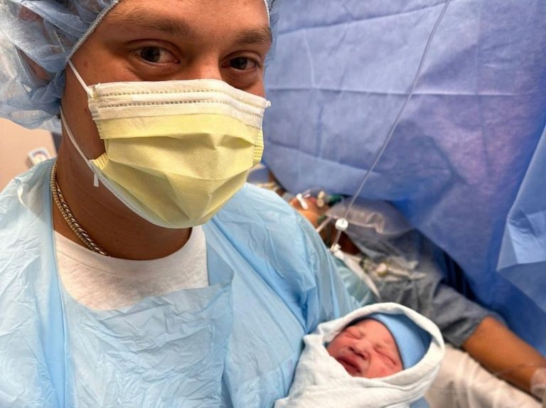 Wilmer Flores shares a photo with his newly born son